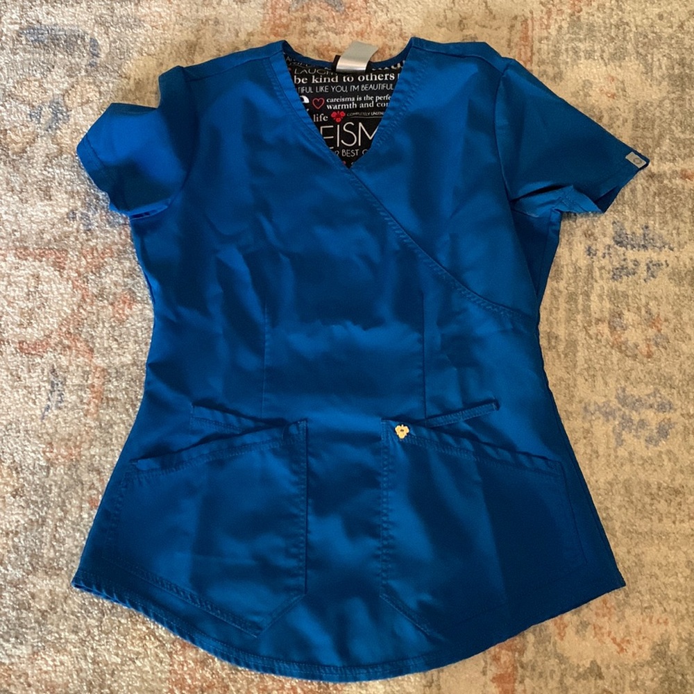 Careisma scrub top. Size small. Blue.
